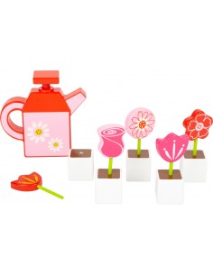 Fleurs en bois avec arrosoir